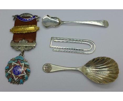 A silver lodge medal, a silver caddy spoon, a silver money clip and a William IV silver salt spoon