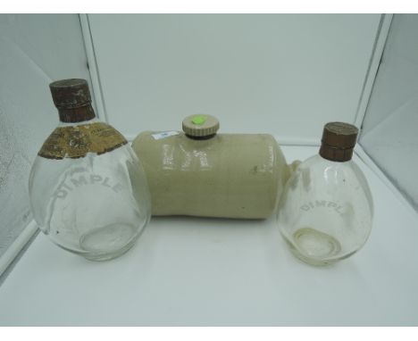 Two Bimple whiskey bottles and ceramic bed warmer