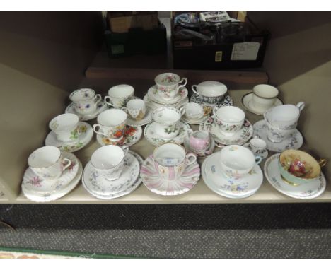A selection of tea cups and saucers including Shelley triptych 