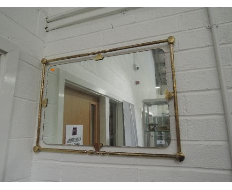 A vintage tubular brass frame mirror86CM X 61CM
