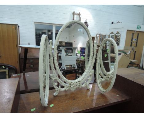 A vintage triptych dressing table mirror