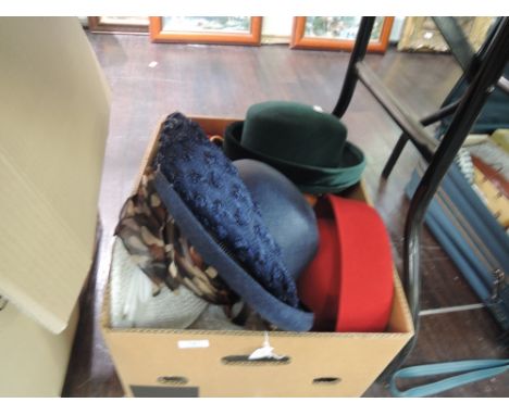 A lot of ten vintage 1980s hats and two pairs of 1960s nylon gloves.