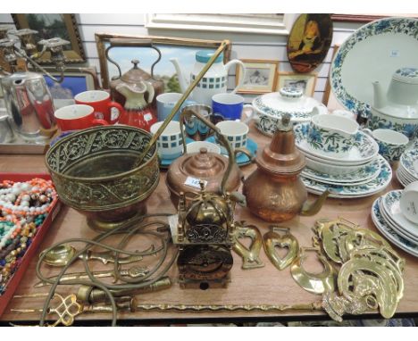 A selection of copper and brass wares including lantern clock