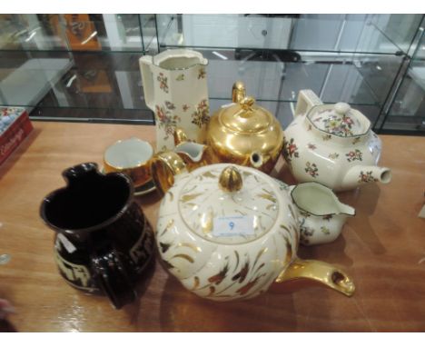 A selection of tea wares including Royal Worcester gold gilt tea set