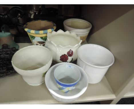 A selection of ceramic planters and similar