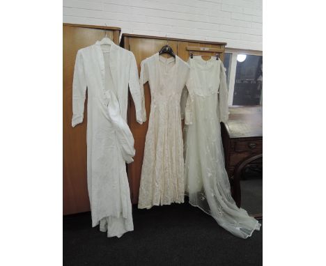 Three vintage wedding dresses, approx 50s and 60s. Good condition, smaller sizes.