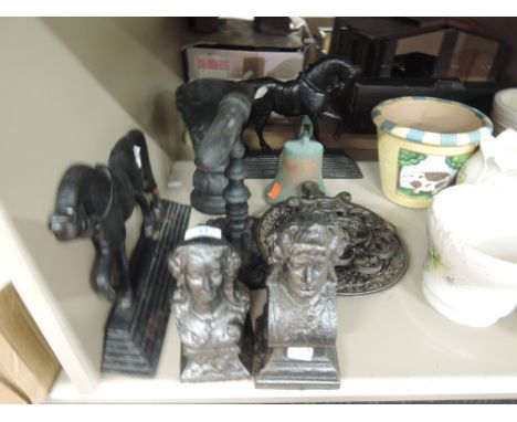 A selection of vintage cast iron and similar including 19th century goffering iron, doorstops, Coalbrookdale style dish etc