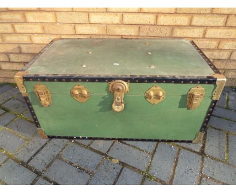 A vintage Overpond shipping trunk, approximately 42 cm x 91 cm x 51 cm.