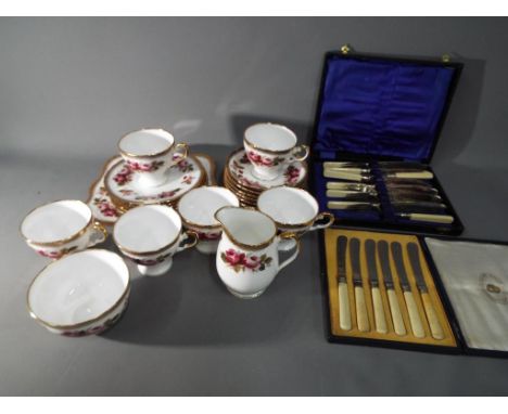 A Royal Tuscan tea service comprising plates, cups, saucers, sugar bowl and creamer also included in the lot are  two cases o