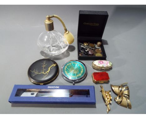 A small mixed lot of collectibles to include Royal Doulton perfume atomizer, Swarovski Crystalline Stardust roller ball pen, 