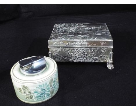 A lot comprising of a Jersey pottery, Ronson lighter and a white metal embossed trinket box.
