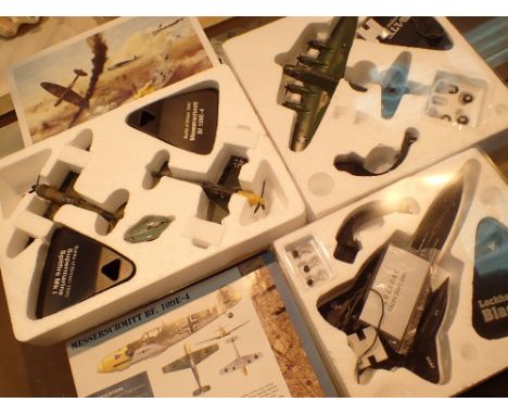 Three diecast model planes including Lockheed Blackbird