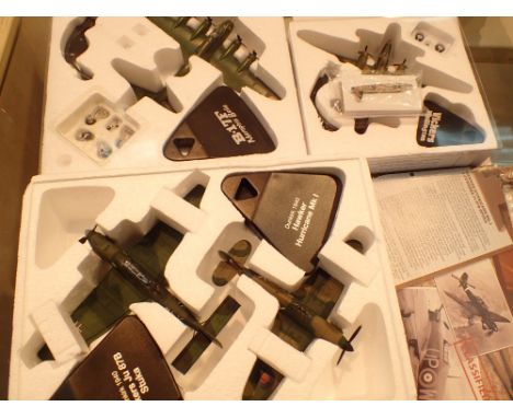 Three diecast model planes including Wellington