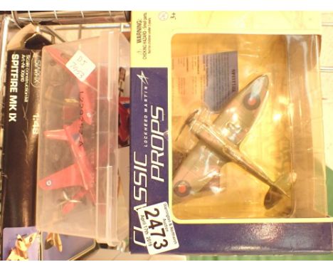 Collection of diecast model planes including a Spitfire model kit