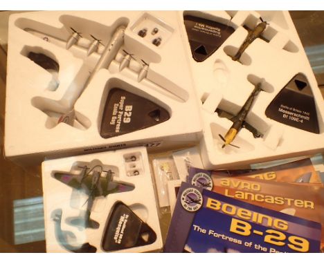 Three diecast model planes including Mosquito