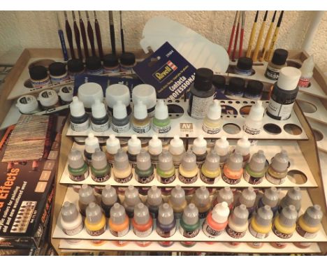 Large collection of high quality mainly unused model paints / brushes and hobby stands  CONDITION REPORT: The model paints ar