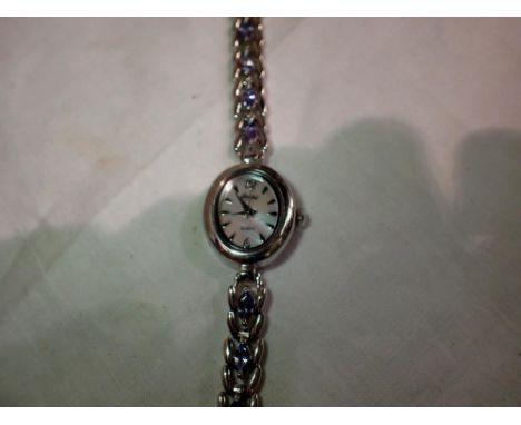 GEMS: ladies 925 silver quartz wristwatch on a stone set 925 silver bracelet, working at lotting. P&amp;P Group 1 (£14+VAT fo