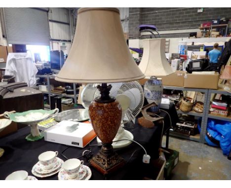Metal based table lamp with bulbous resin stem, H: 90 cm. All electrical items in this lot have been PAT tested for safety an