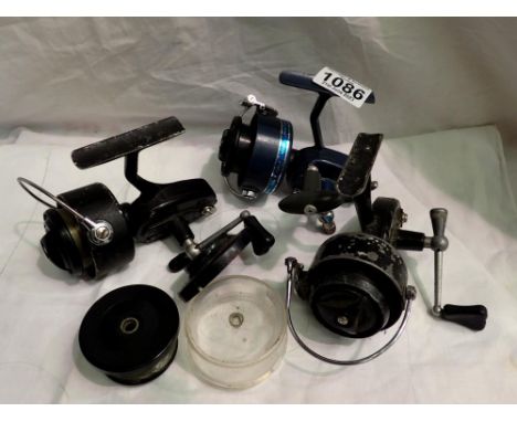Three Mitchell reels and a spare spool. P&amp;P Group 2 (£18+VAT for the first lot and £3+VAT for subsequent lots) 