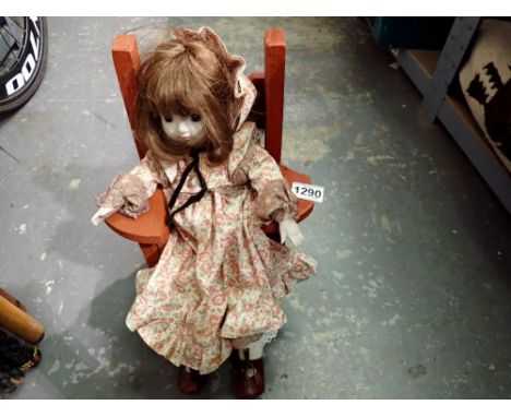 Doll in stick back chair. Not available for in-house P&amp;P 