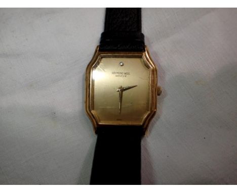 Raymond Weil diamond set wristwatch on a black leather strap, not working at lotting. P&amp;P Group 1 (£14+VAT for the first 