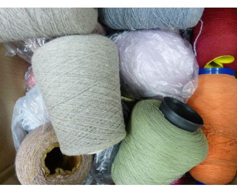 A VERY LARGE PARCEL OF KNITTING MACHINE WOOL contained in a tin trunk, four cardboard boxes and eight sacks (on left hand sid