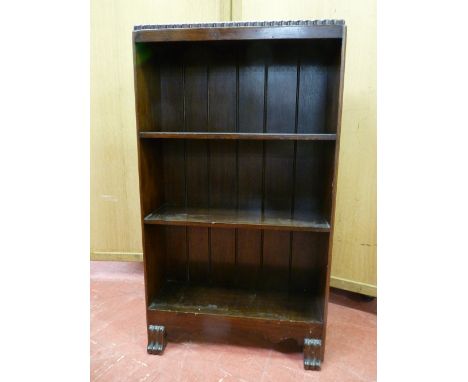 A NEAT MAHOGANY THREE SHELF BOOKCASE with shaped lower apron on reeded feet, 92 cms high, 53.5 cms wide, 19 cms deep