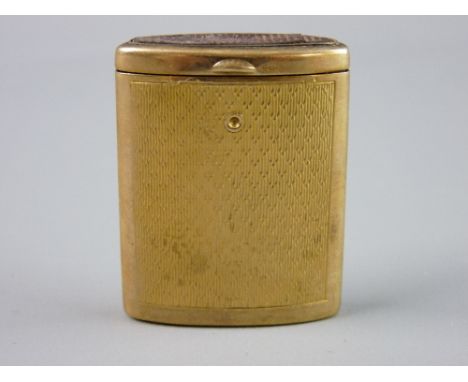 A NINE CARAT GOLD ENGINE TURNED MATCH HOLDER of oval form with pull-out body, 31 grms