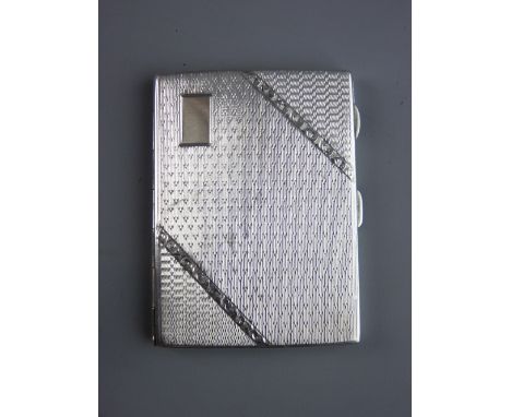 A SILVER CIGARETTE CASE with engine turned decoration, 8.5 x 6 cms, Birmingham 1929, 2.6 troy ozs