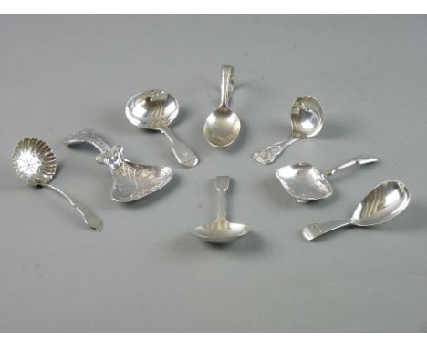 A PARCEL OF EIGHT MIXED SILVER CADDY SPOONS, 3.8 troy ozs total