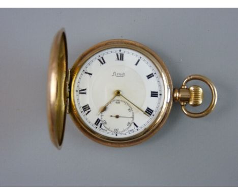 A GENT'S YELLOW METAL ENCASED DENNISON STAR POCKET WATCH with white enamel dial, Roman numerals and sweep seconds dial
