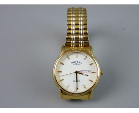 A GENT'S YELLOW METAL ENCASED CIRCULAR DIAL ROTARY QUARTZ CALENDAR WRISTWATCH with expanding bracelet, spare links, in origin