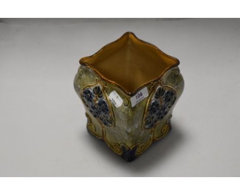 A ceramic planter by Royal Doulton in the Lambeth.