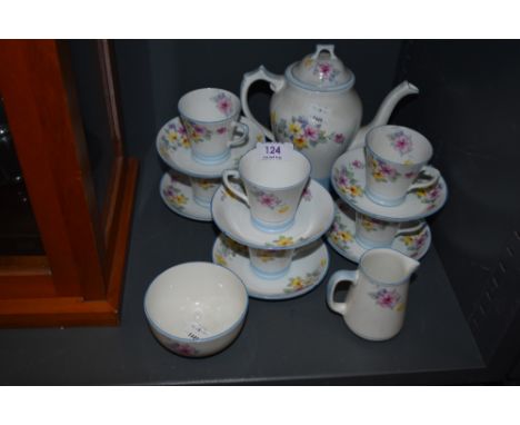A Collingwood bone China part tea service having art deco design.
