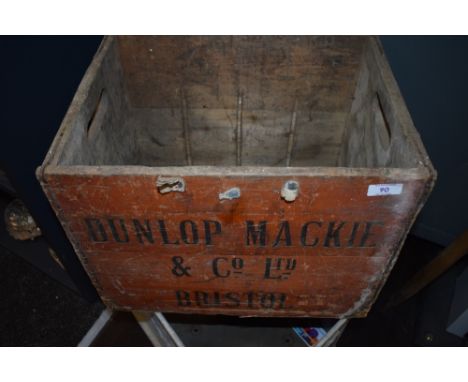 A vintage advertising crate for Dunlop Mackie Bristol