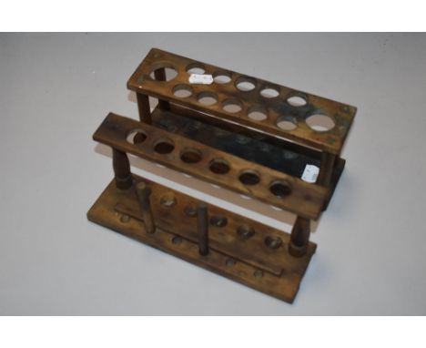 A set of two vintage laboratory test tube racks