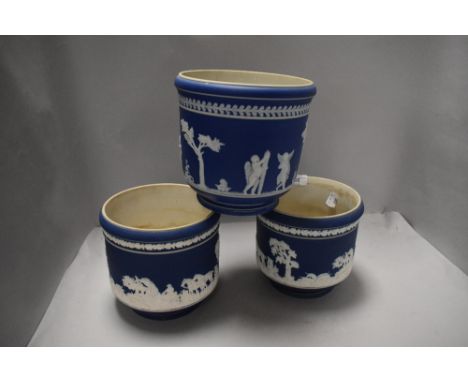 A pair of ceramic platers by Adams in a Jasperware design and a similar Adams planter