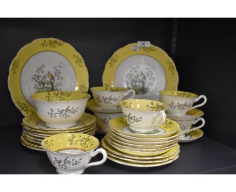 A selection of cups,saucers,plates and sugar basin 'De olde English Grosvenor China Jackson and Gosling England' having white