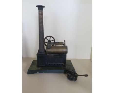 A German Bing live steam static engine with long chimney, 33cm tall, used condition, original paint 