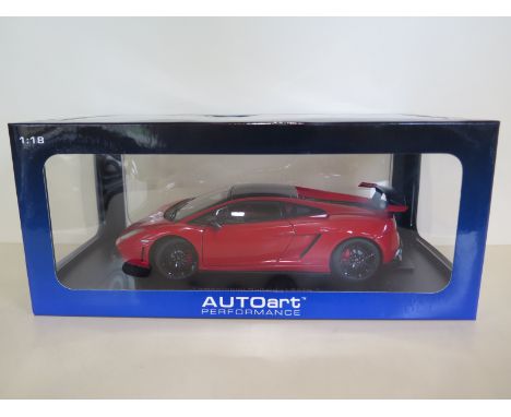 An Autoart Performance 1:18 scale, die-cast model Lamborghini Gallardo LP570 Supertrofeo Stradale, With original box and  as 