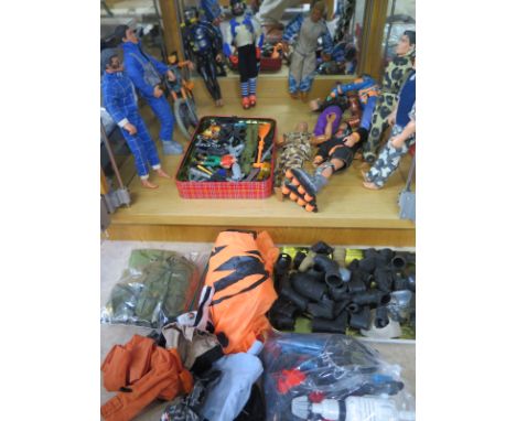 A collection of 10 Action man figures, clothing and accessories, and an X figure, one missing a leg 