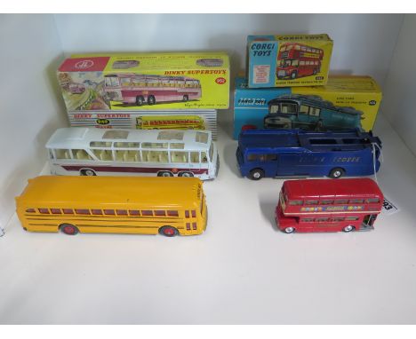 Three vintage diecast models of buses, A Dinky Super Toys Vega Major luxury coach 952, a Wayne school bus with windows & seat