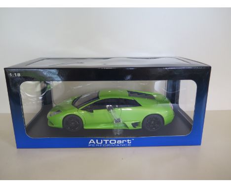 An Autoart Performance 1:18 scale die-cast model car, a Lamborghini Murcielago LP640, in green, with original box and as new 