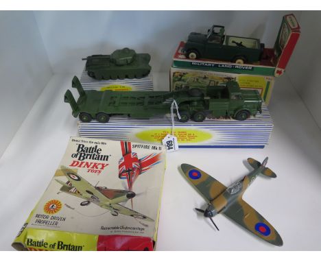 Four vintage and retro die-cast military vehicles, a Dinky Supertoys Tank Transporter 660, a Centurian Tank 651, a Dinky, Bat