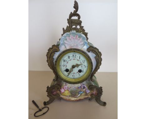 A french Ormulu mounted china mantle clock, striking on a gong - 32cm tall, minor chips to back feet, running in saleroom 