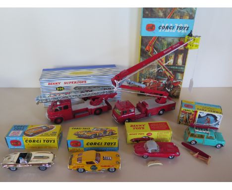 A collection Dinky and Corgi die-cast models, a Corgi Surfing BMC Mini Countryman 485 with accessories, a Dinky Super Toys fi