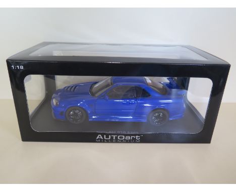 An Autoart Millennium 1:18 scale die-cast  Nissan Nismo GT R Z Tune car, with original box as new 