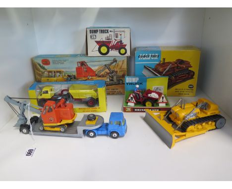 Four die-cast model construction model vehicles, Corgi Major Toys Machinery Carrier with Bedford Tractor, a Euclid TC-12 trac