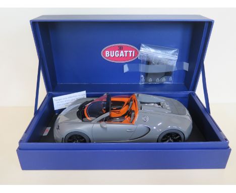 A MR collection models, handmade, 1:18 scale diecast model Bugatti with detachable roof and original presentation box, as 