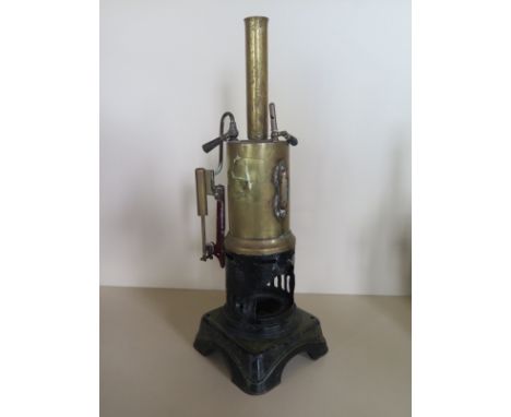 A Bing vertical static steam engine, 31cm tall, signs of repaint wear and repair to boiler 